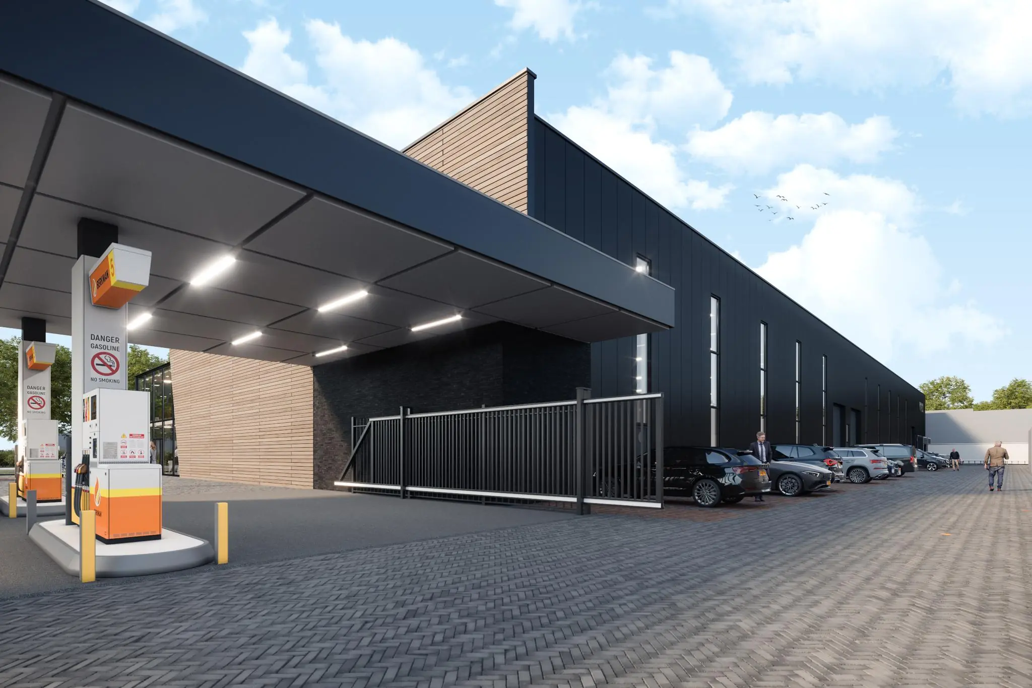 Moderne bedrijfslocatie aan de Nijverheidsweg met tankstation, parkeerplaatsen en zwart-gevelig bedrijfsgebouw.