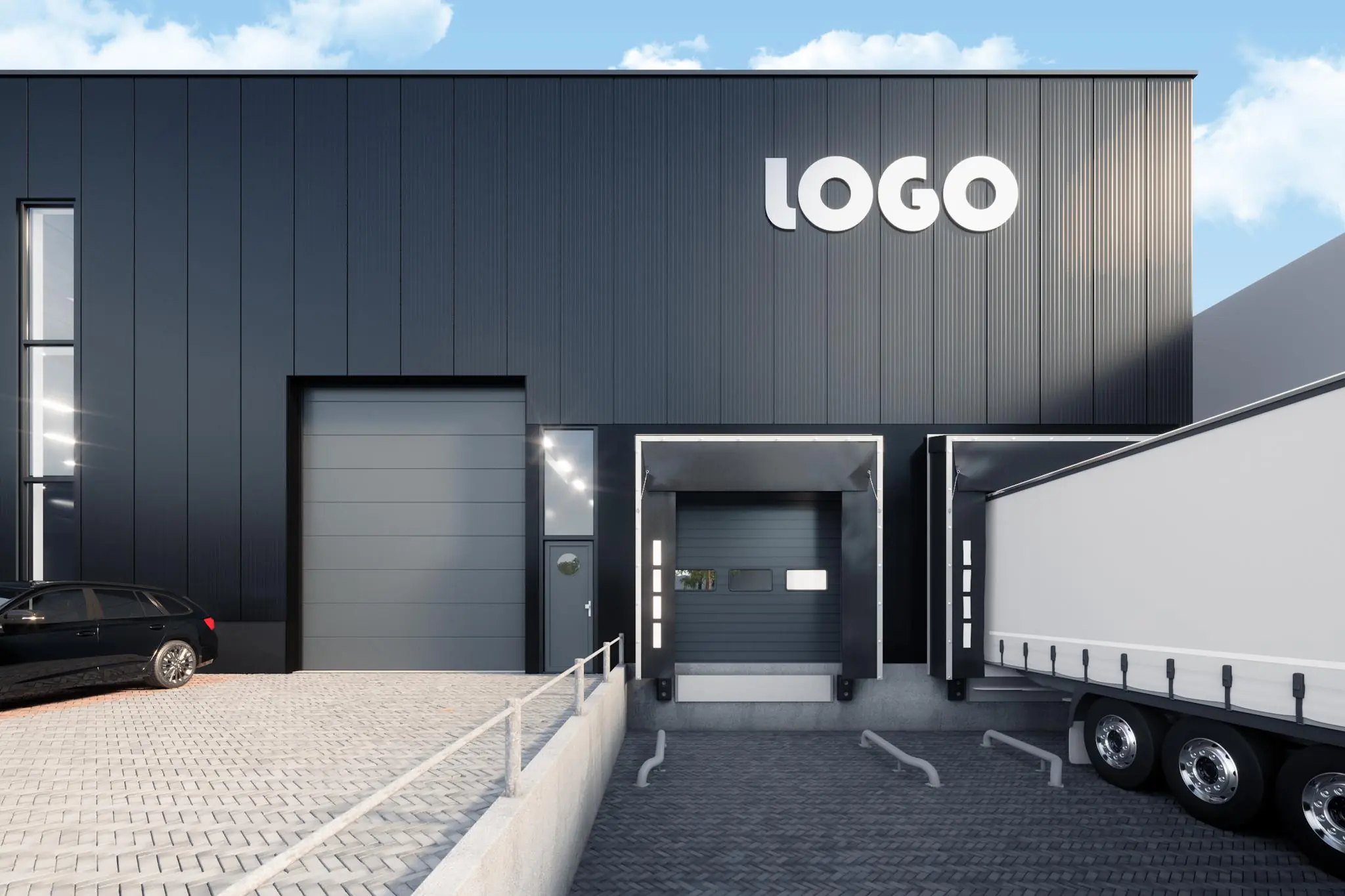 Moderne bedrijfsloods aan de Nijverheidsweg met laadperrons, vrachtwagen en parkeerplaats.