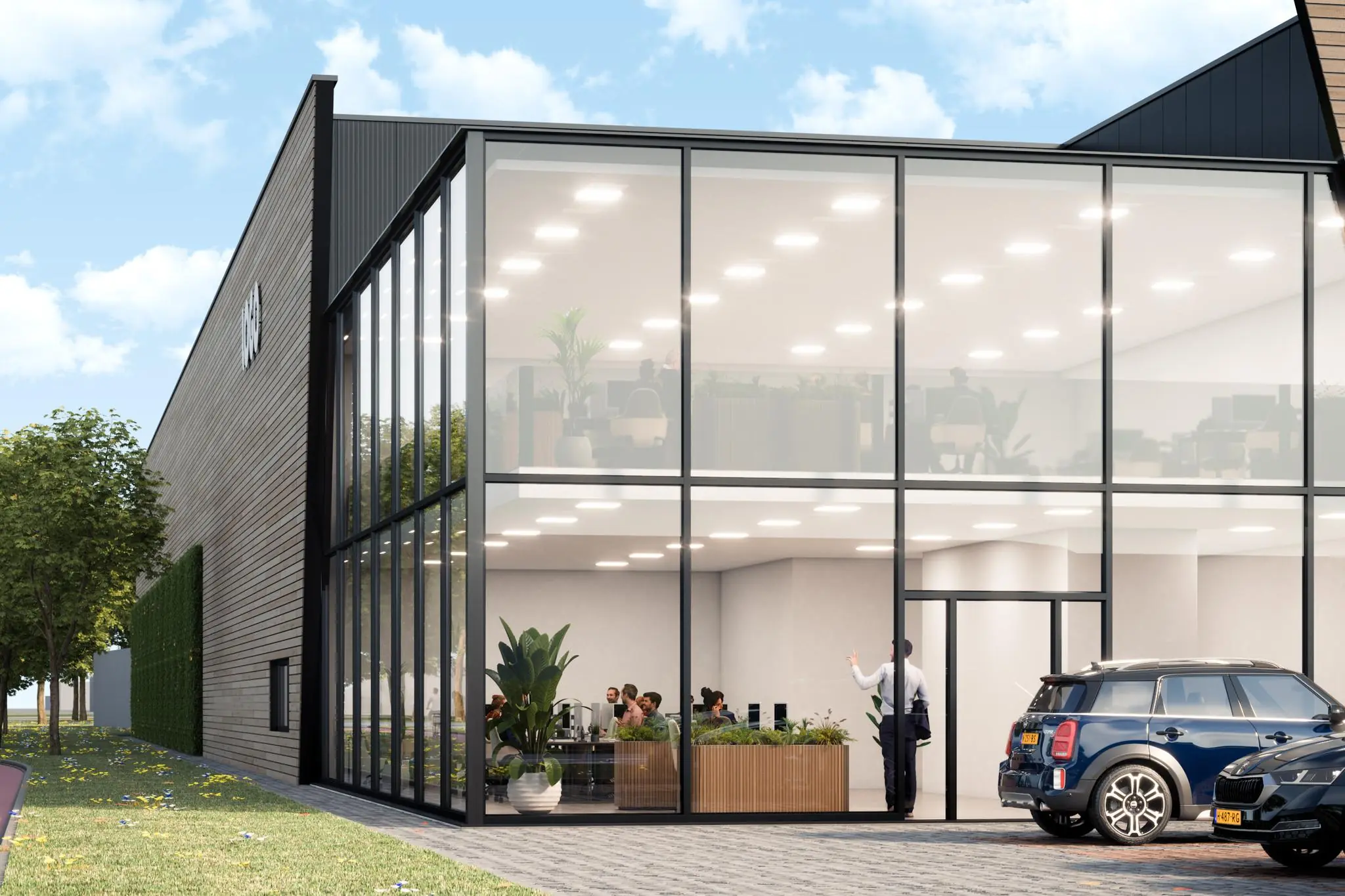 Moderne kantoorgevel aan de Nijverheidsweg met glazen puien en geparkeerde auto's op de voorgrond.