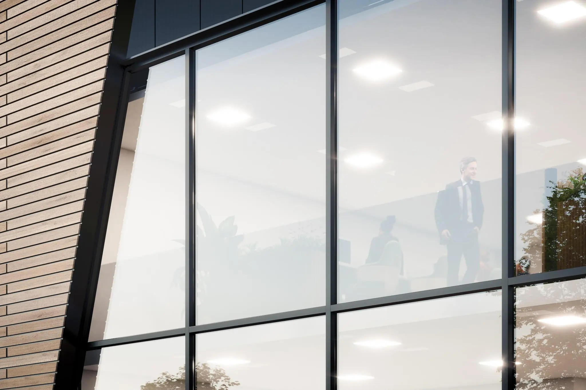 Kantoorpand aan de Nijverheidsweg met zicht op mensen achter grote glazen ramen.