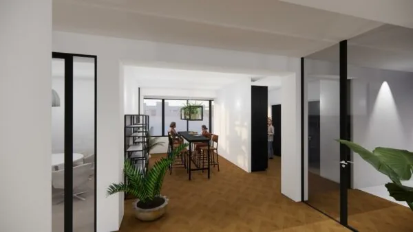 Moderne kantooruimte aan de Volmerlaan met hoge tafel, mensen in gesprek en veel natuurlijk licht.