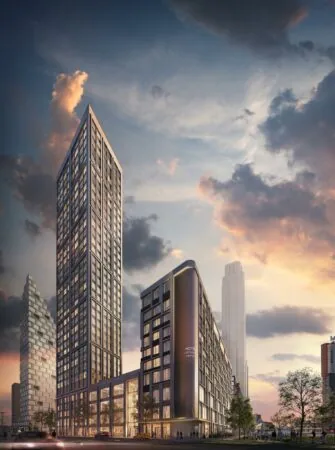 Moderne hoogbouw aan de Rijnhavenkade in Rotterdam tijdens zonsondergang.