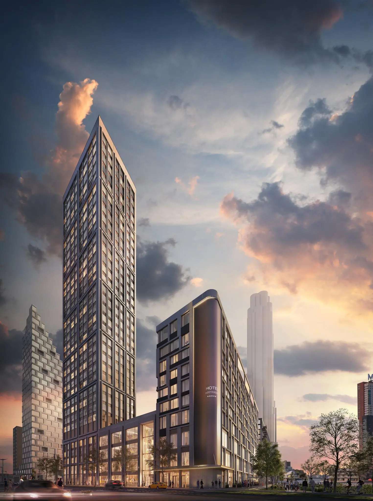 Moderne hoogbouw aan de Rijnhavenkade in Rotterdam tijdens zonsondergang.