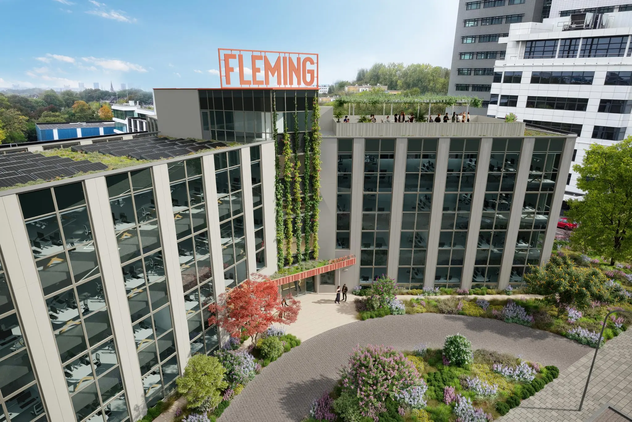Modern kantoorgebouw aan de Fleminglaan met zonnepanelen op het dak, groene gevel en daktuin met mensen.