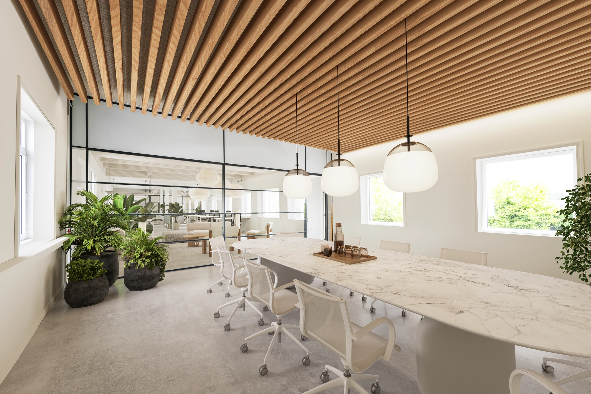 Moderne vergaderruimte aan de Vliegtuigstraat met een marmeren tafel, designstoelen, houten lattenplafond en veel natuurlijk licht.