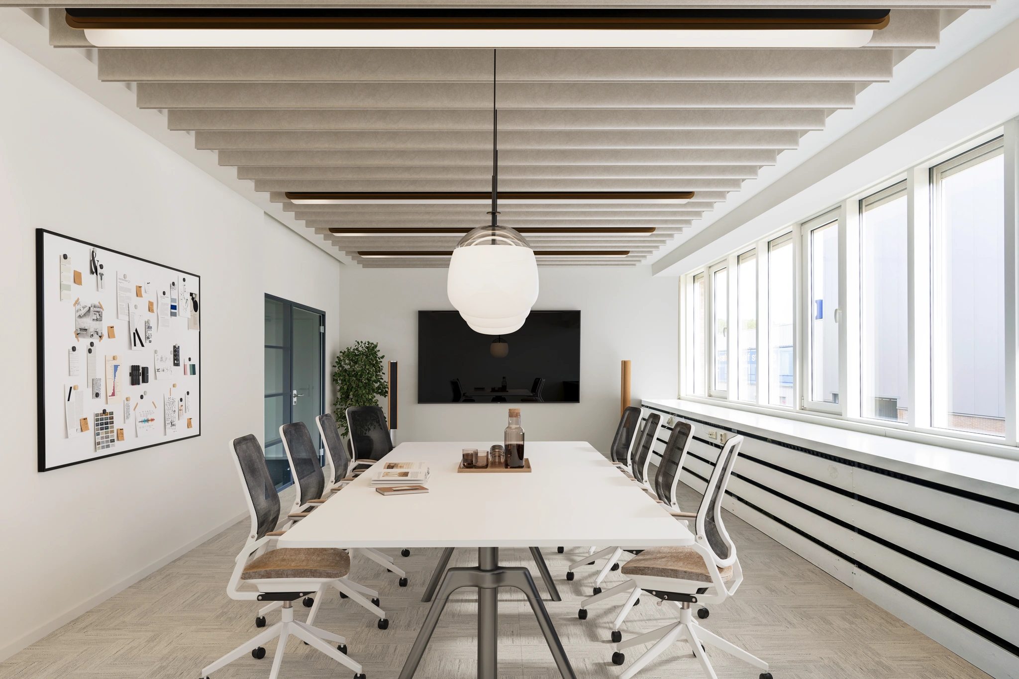 Moderne vergaderruimte aan de Vliegtuigstraat met lange tafel, ergonomische stoelen, groot scherm en veel daglicht.