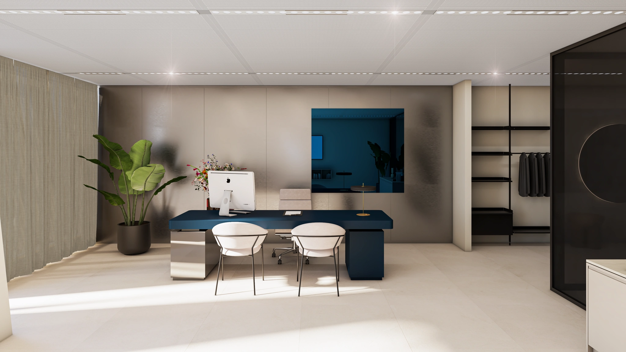 Modern kantoorinterieur aan de Strawinskylaan met strak bureau, grote plant en open kledingrek.