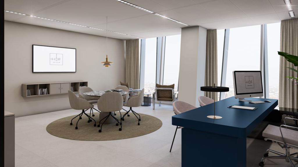 Modern ingericht kantoor aan de Strawinskylaan met vergadertafel, werkplek en uitzicht op de stad.