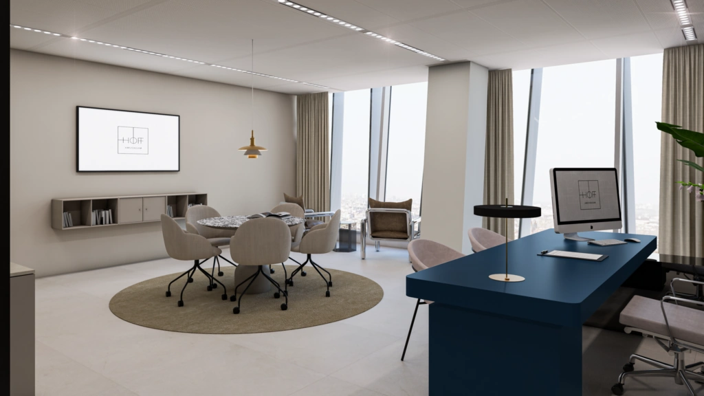 Modern ingericht kantoor aan de Strawinskylaan met vergadertafel, werkplek en uitzicht op de stad.
