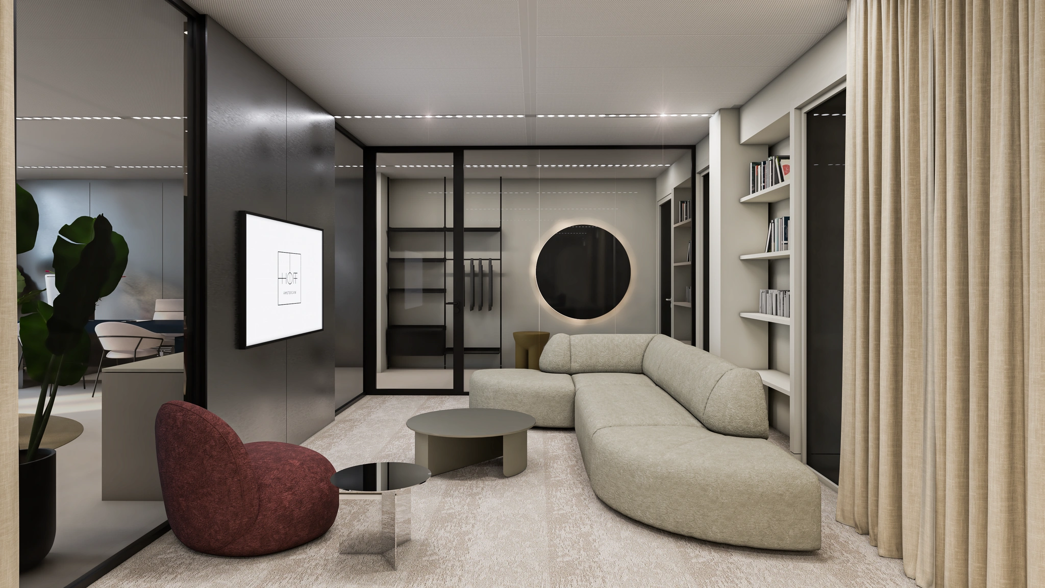 Modern ingerichte lounge in een kantoor aan de Strawinskylaan met een beige hoekbank, designstoelen en glazen wanden.