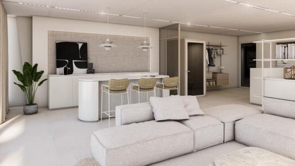 Modern ingerichte open woonruimte met een keukenbar, licht interieur en designmeubilair aan de Strawinskylaan.