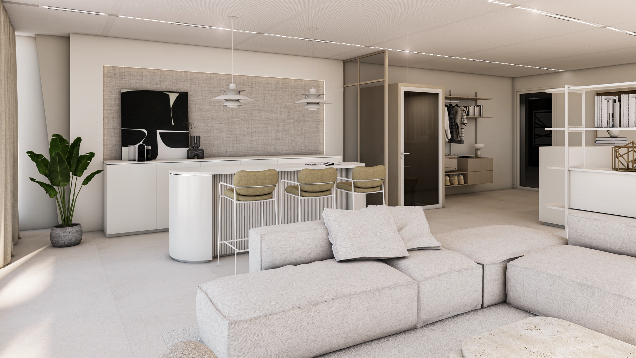 Modern ingerichte open woonruimte met een keukenbar, licht interieur en designmeubilair aan de Strawinskylaan.