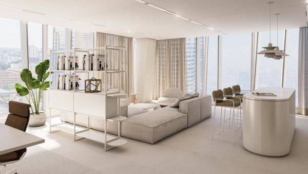 Modern ingericht kantoor met een loungehoek, hoge stoelen aan een bartafel en uitzicht op de Zuidas vanaf de Strawinskylaan.