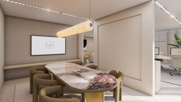 Vergaderruimte met een marmeren tafel, moderne stoelen, hanglamp en scherm met het logo van HOFF Amsterdam aan de Strawinskylaan.