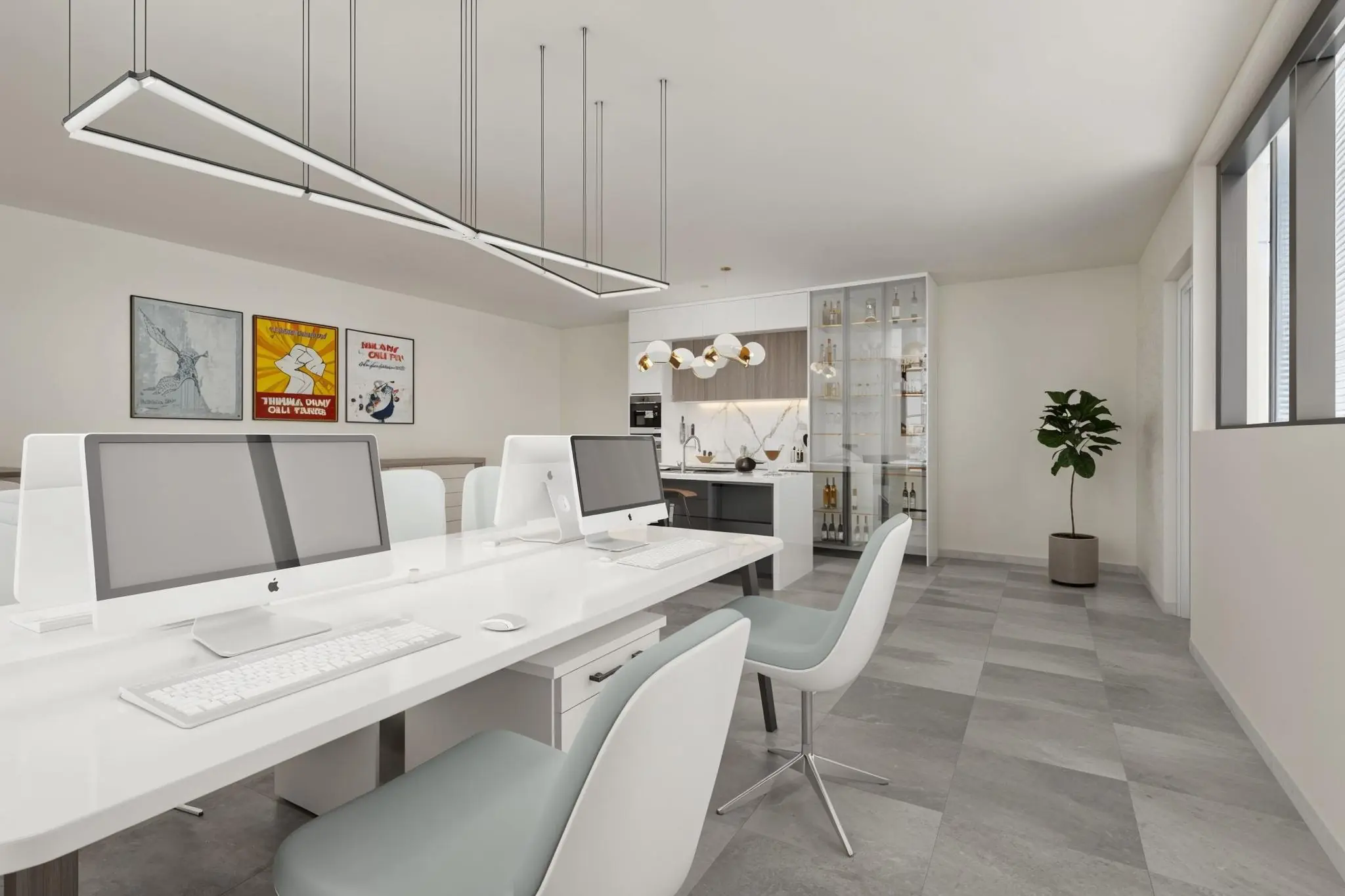 Modern ingerichte kantoorruimte met strakke werkplekken, Apple-computers, een open keuken en wanddecoratie.