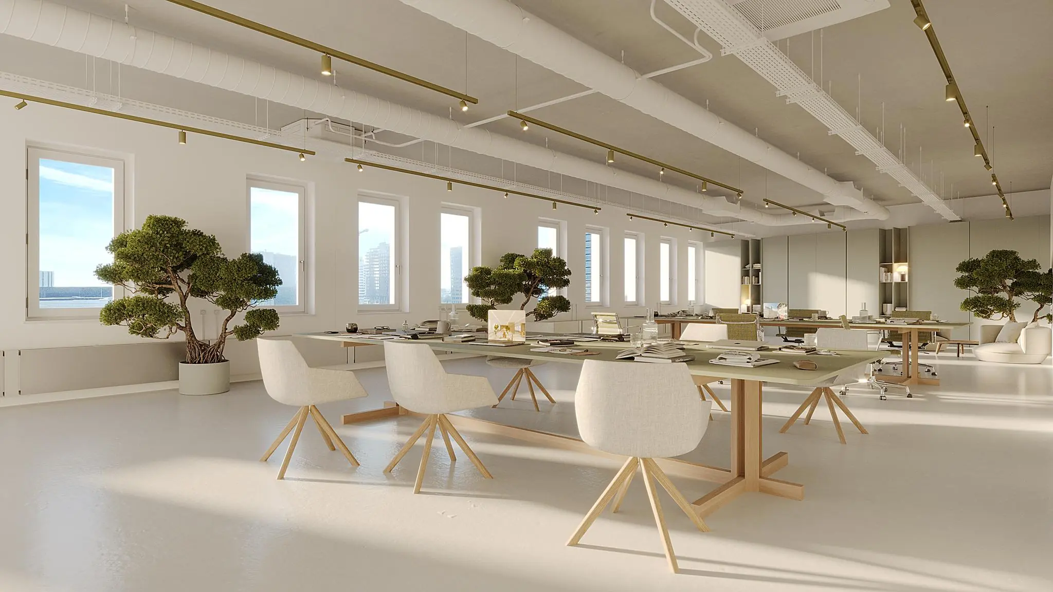 Modern, licht kantoorinterieur aan de Johan Cruijff Boulevard met minimalistisch meubilair en grote groene planten.