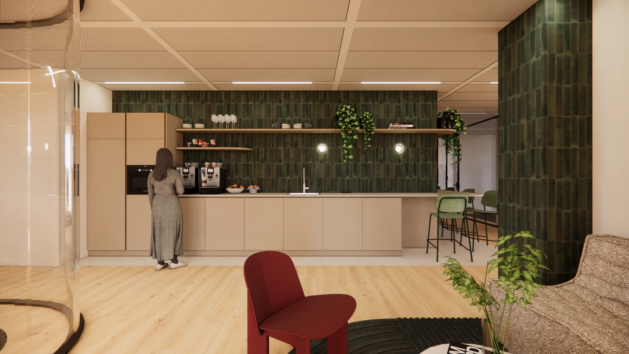 Moderne pantry in een kantoor aan de Beethovenstraat met een vrouw die koffie zet bij een koffiemachine.