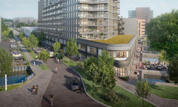 Moderne nieuwbouw aan de H.J.E. Wenckebachweg met appartementen, een parkeerterrein, groenvoorziening en een terras aan het water.