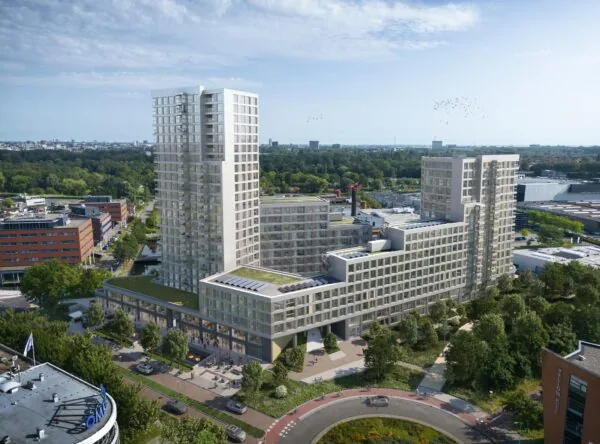 Luchtfoto van een modern appartementencomplex aan de H.J.E. Wenckebachweg in een groene stedelijke omgeving.