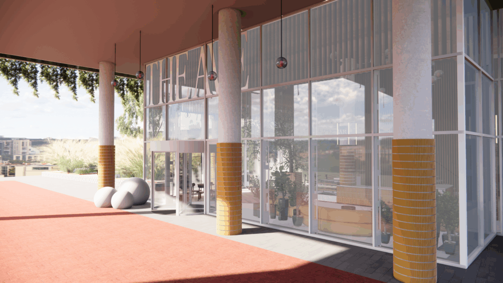 Moderne glazen entree van het Scorpius Theater met hoge zuilen en planten binnenin.