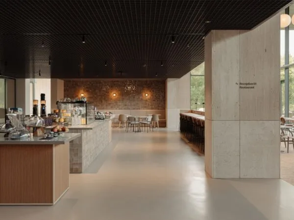 Modern ingerichte koffiebar en eetruimte aan de Nachtwachtlaan met warme verlichting en zithoeken.