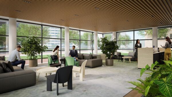Moderne en lichte entreehal met zithoeken, planten, en mensen in gesprek of wachtend.