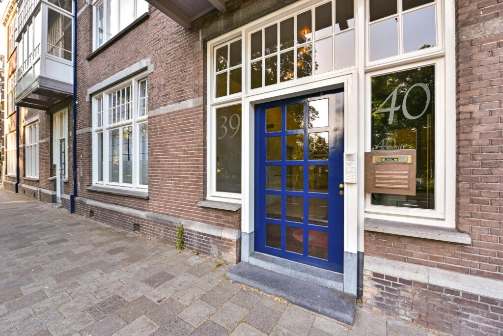 Voorgevel van een karakteristiek pand aan de Maliesingel met een blauwe voordeur en huisnummers 39 en 40.