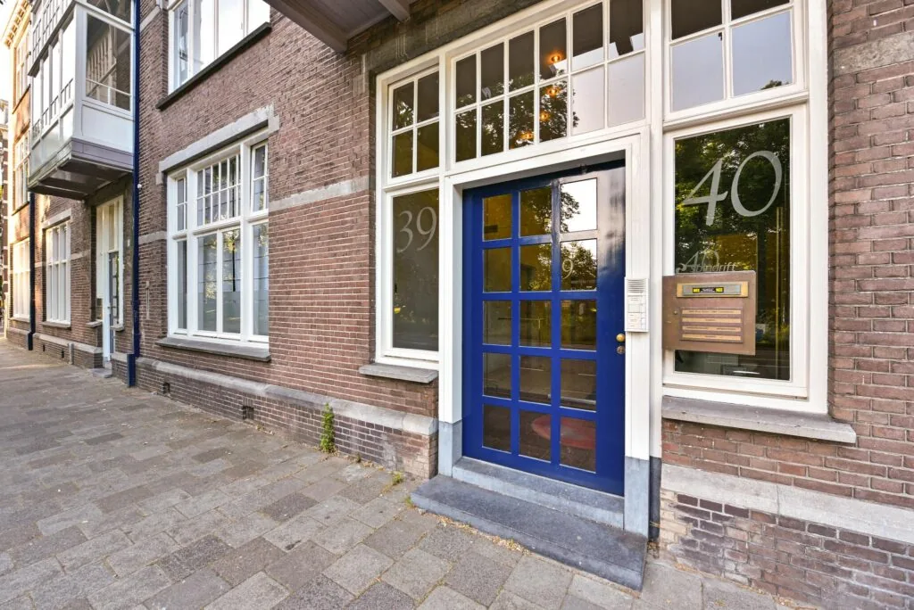 Voorgevel van een karakteristiek pand aan de Maliesingel met een blauwe voordeur en huisnummers 39 en 40.