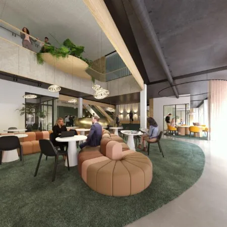 Modern ingerichte kantoorlobby aan de Reykjavikstraat met loungezitjes, werkplekken en een open verdieping.