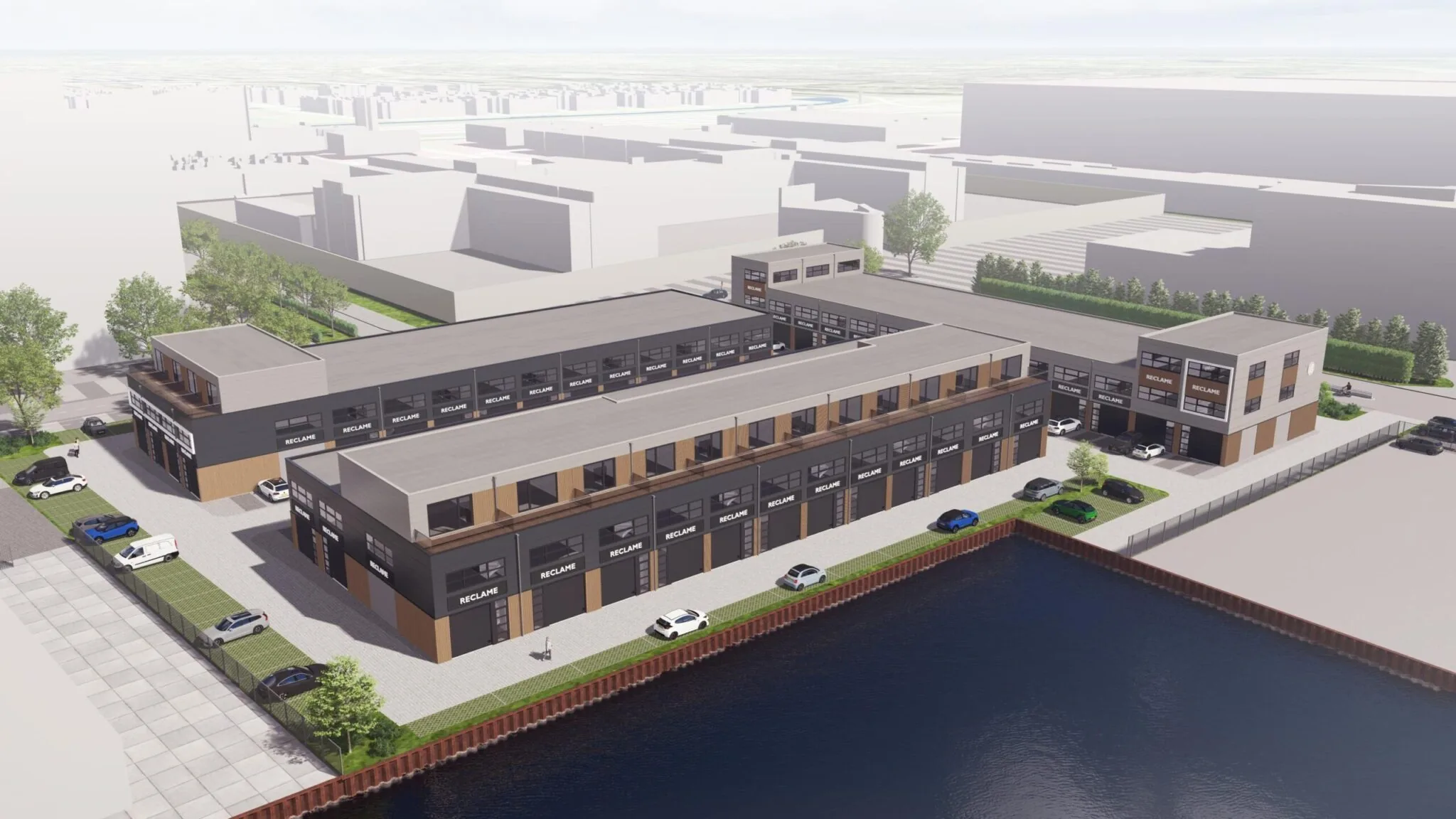 Luchtfoto van het nieuwbouwproject De Liesbosch met moderne bedrijfsunits aan het water.