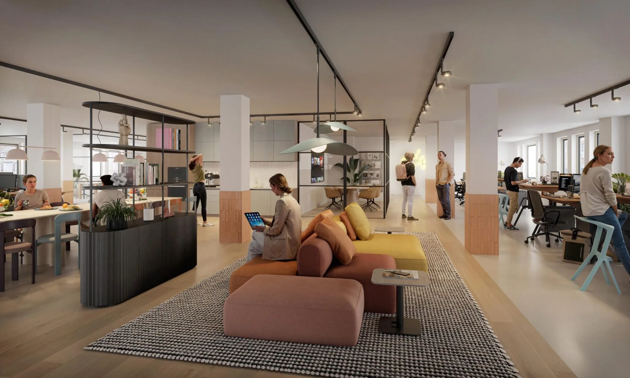 Modern en sfeervol ingerichte kantoorruimte aan de Nieuwe Looiersstraat met werkplekken, zithoeken en een open keuken.