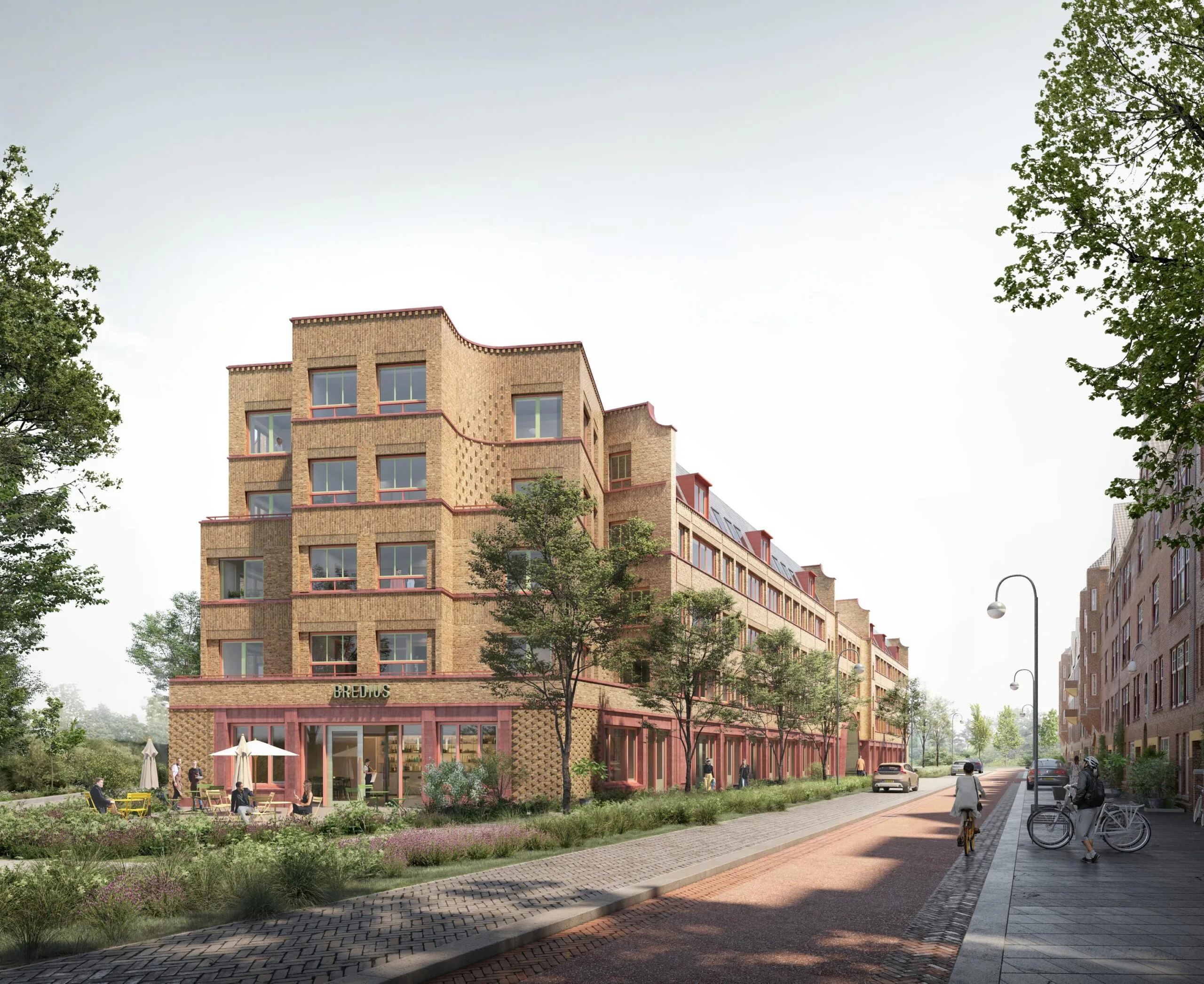 Street view of the newly built Bredius residential complex on Zaanstraat with people walking and cycling.