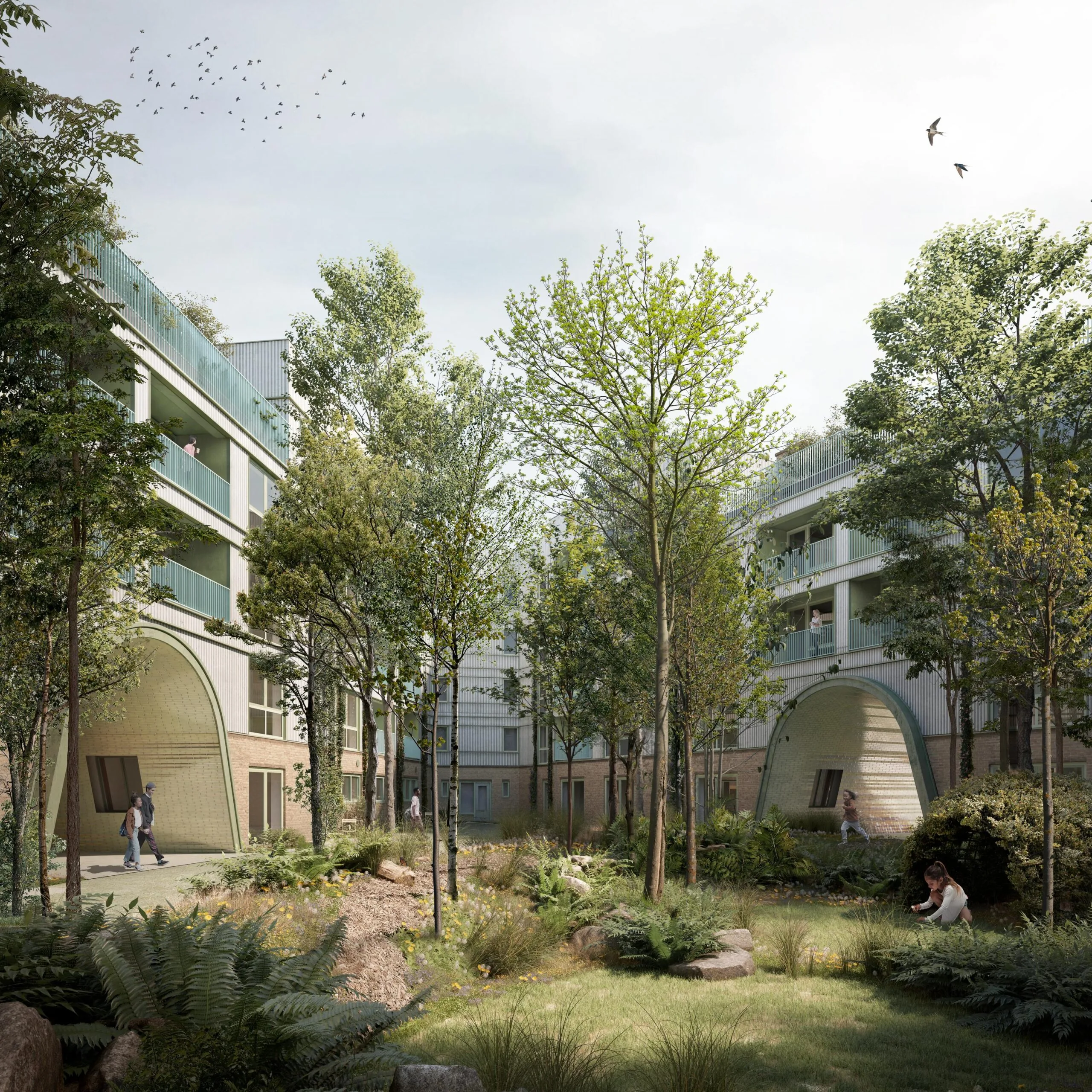 Modern apartment buildings on Zaanstraat with arched entrances surrounded by a lush green courtyard and trees.