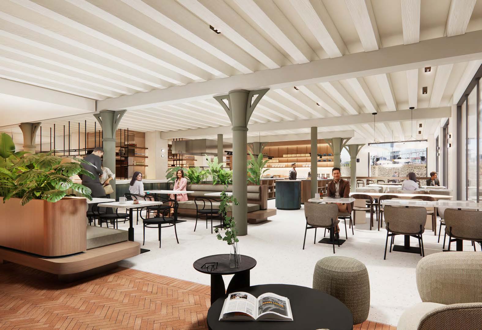 Modern, spacious café interior at Nieuwe Vaart with people sitting and talking in a stylish, light-filled setting.