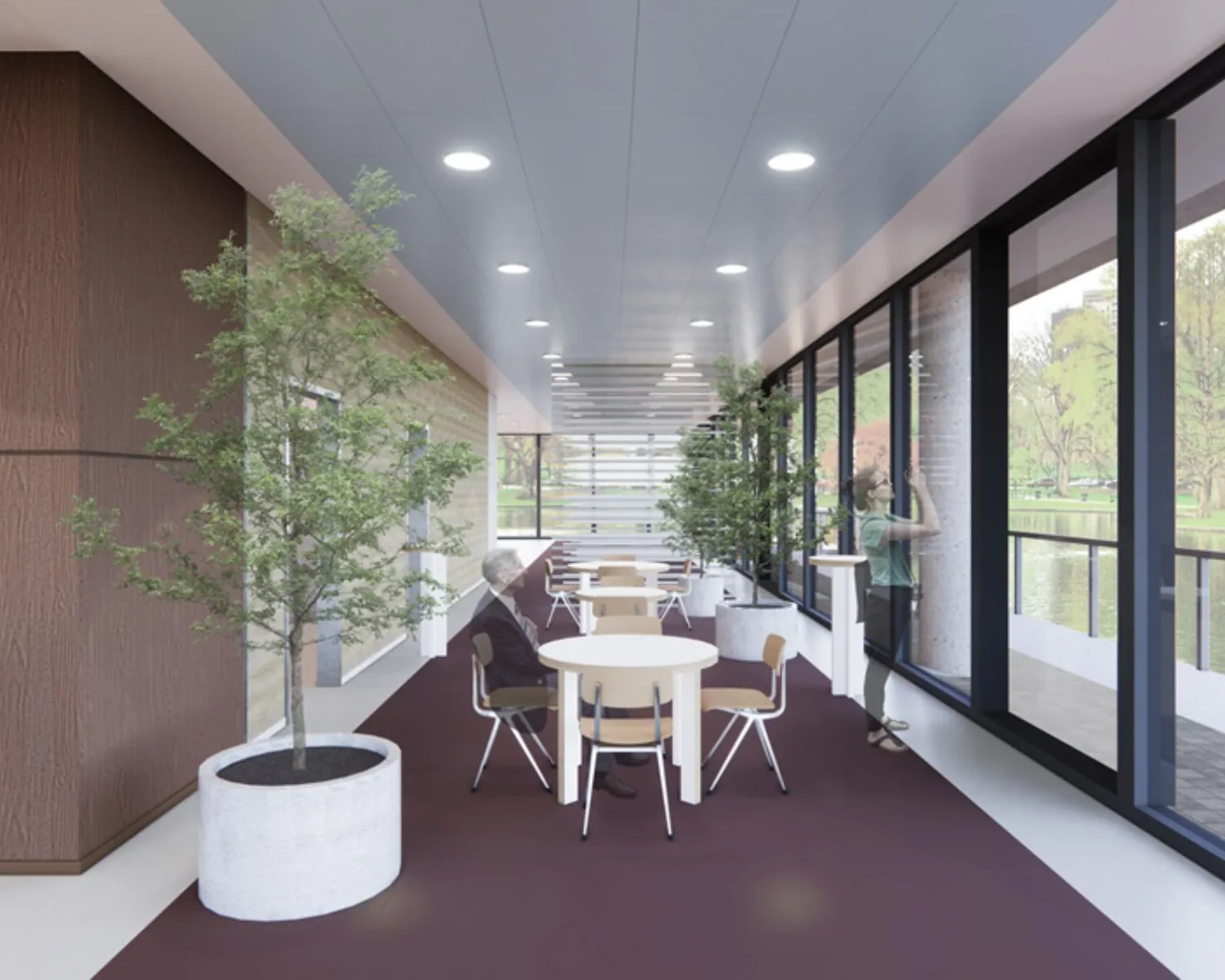 Moderne kantoorruimte aan de Prof. E.M. Meijerslaan 3 in Amstelveen met zitjes, grote ramen en groene planten.