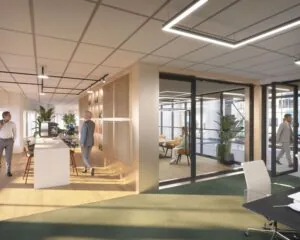 Moderne kantoorruimte aan de Herikerbergweg 288-290 in Amsterdam met open werkplekken, vergaderruimtes en een koffiehoek.