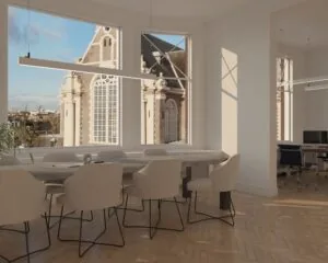 Moderne, lichte kantoorruimte aan de Westermarkt 2 in Amsterdam met uitzicht op de Westerkerk.