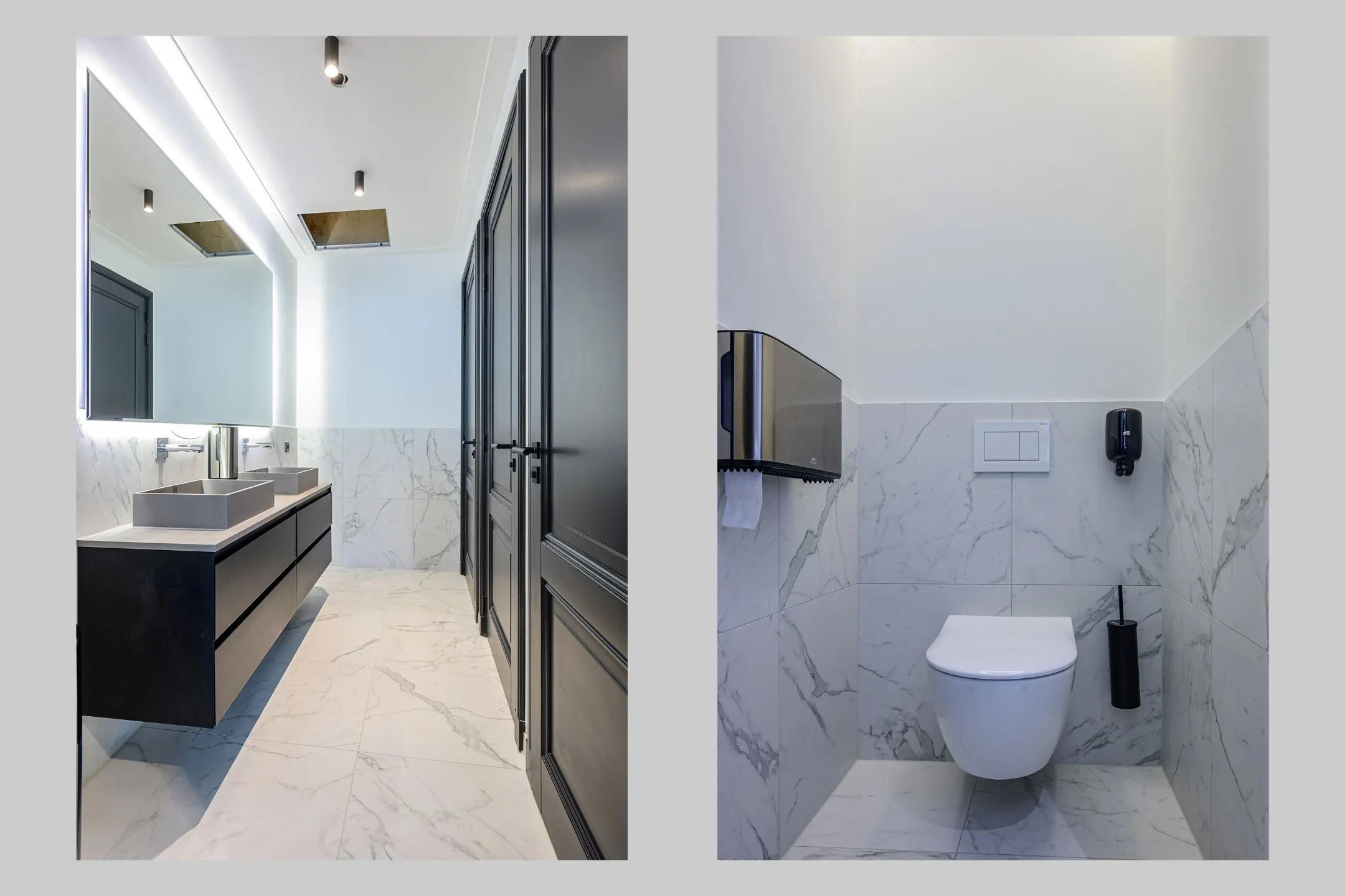 Moderne sanitaire ruimte met marmeren vloeren en wanden, voorzien van zwarte deuren, een wastafelmeubel en een toiletruimte.