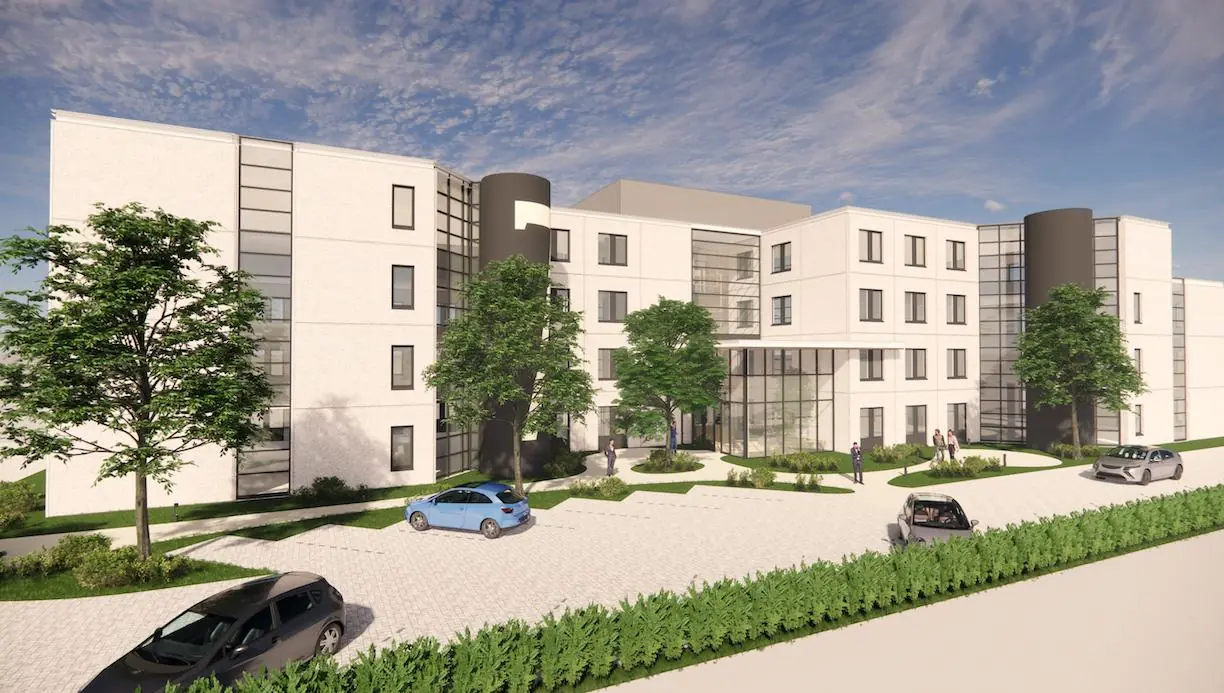 Een moderne, meerlaagse kantoorgebouw aan de Rijnzathe met glazen entree en omliggende parkeerplaatsen.