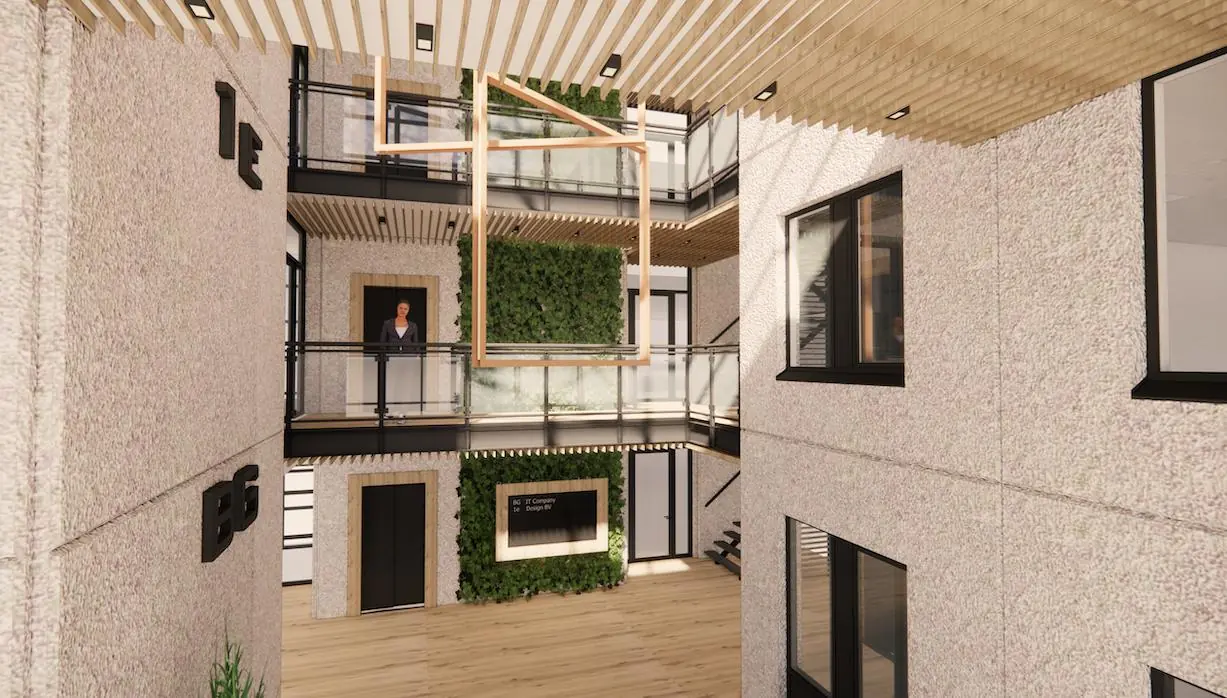 Moderne, open binnentuin van kantoorgebouw Rijnzathe met houten plafondelementen, groene gevels en glazen balustrades.