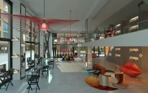 Modern interieur van een stijlvol ingerichte beauty- en kapsalon aan de Papaverweg met make-upstations, opvallende decoratie en kleurrijke zithoeken.