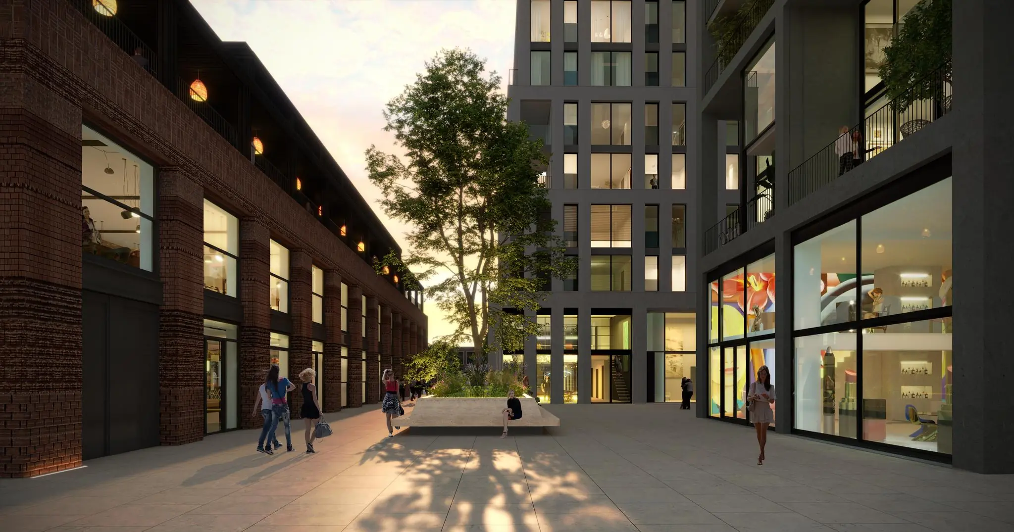 Modern plein aan de Papaverweg met hoge gebouwen, avondlicht en passerende voetgangers.