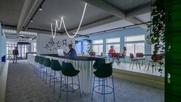 Moderne kantoorruimte aan de Daltonlaan 200 met een bar, zithoek en creatieve muurtekening.