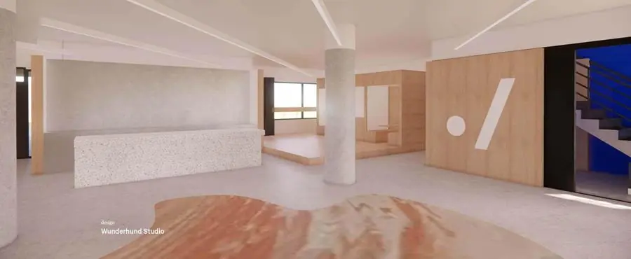 Moderne kantoorruimte in Europalaan 500 met strakke vormen, een terrazzo balie en houten afwerkingen.