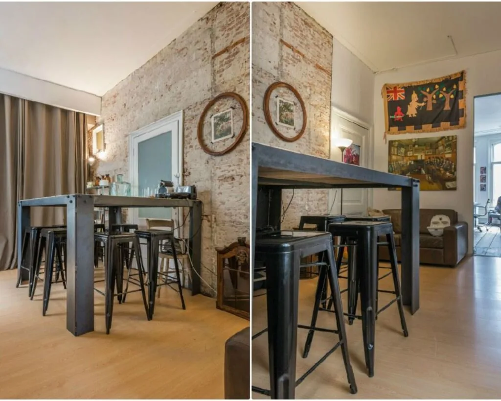 Kantoorruimte met industriële uitstraling en zitgedeelte aan de Nieuwezijds Voorburgwal 340 in Amsterdam.