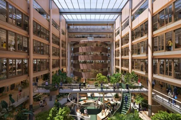 Moderne kantoorruimte met veel glas, hout en groen aan de Fred. Roeskestraat 100 in Amsterdam.