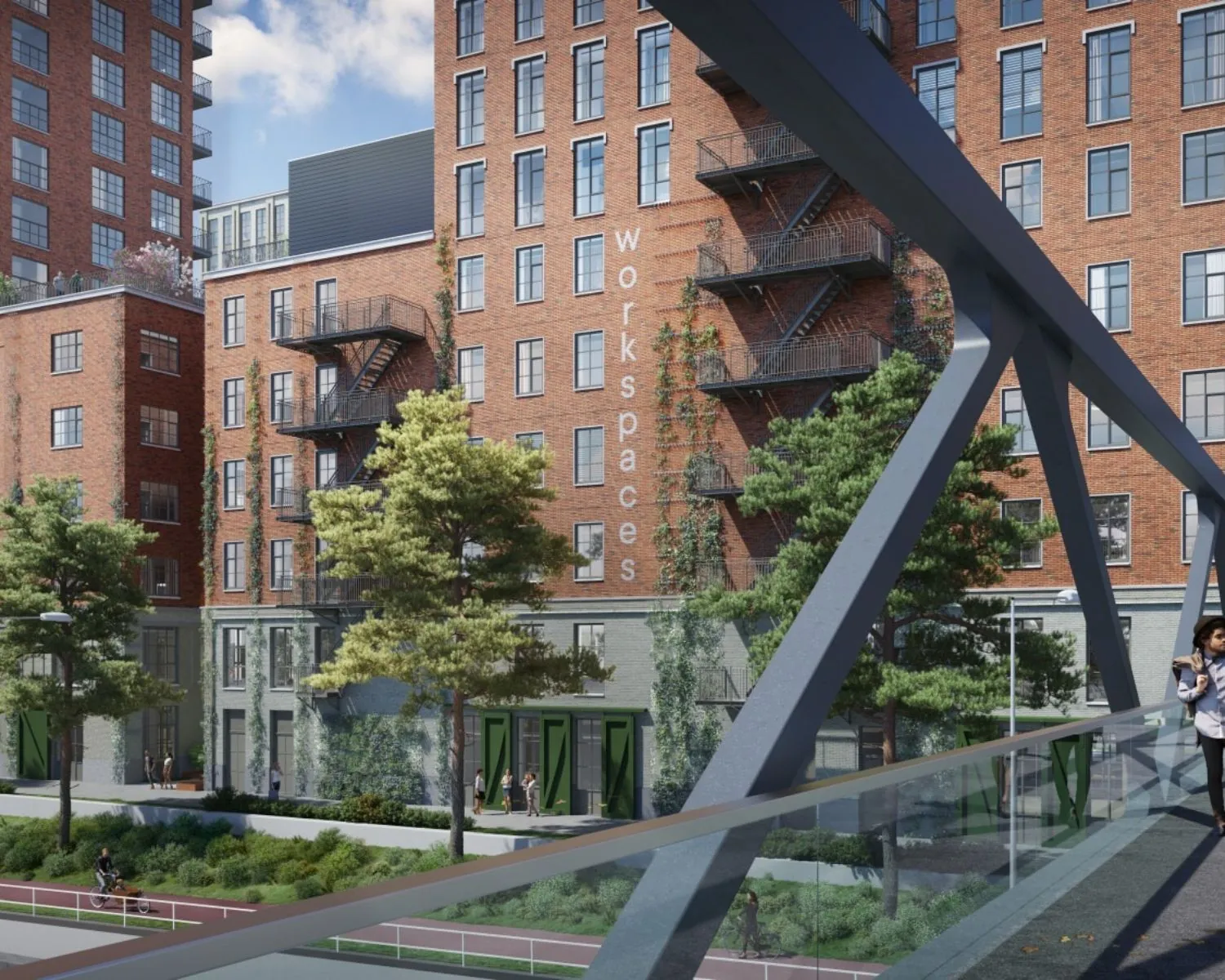 Kantoorruimte aan de Karl Weisbardstraat in Rotterdam met rode bakstenen gevel en buitentrappen, gezien vanaf een voetgangersbrug.