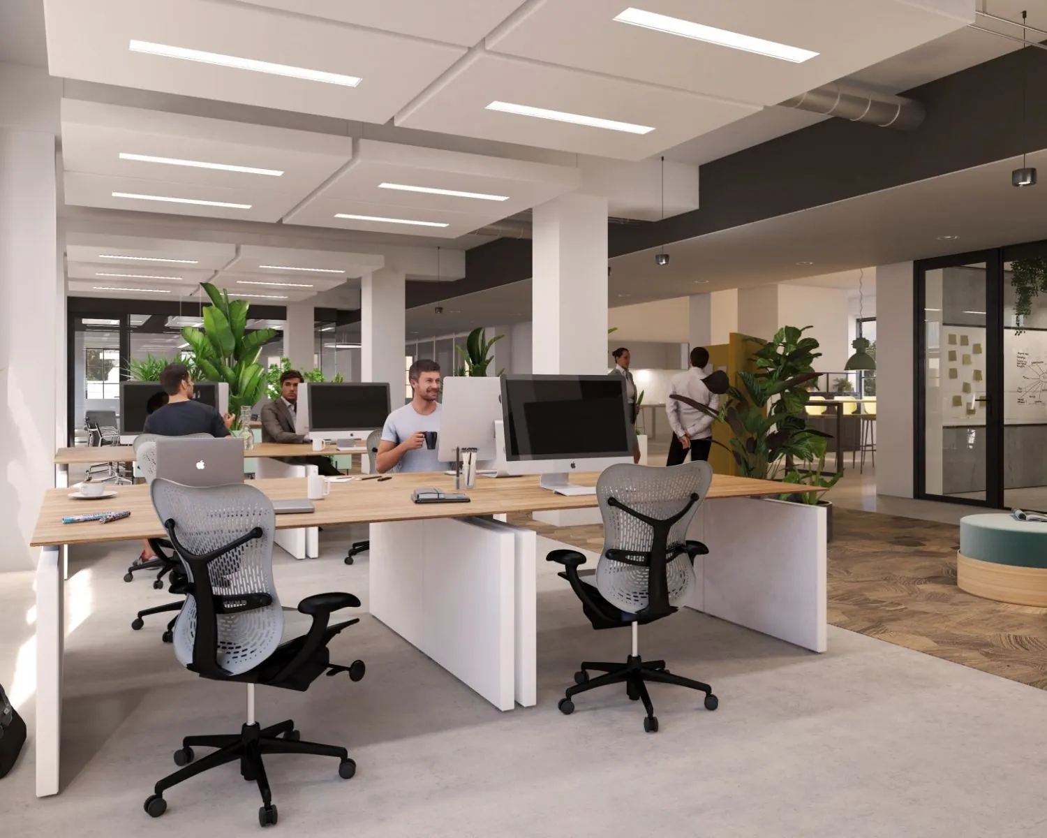 Moderne kantoorruimte met open werkplekken en groene accenten aan de Karl Weisbardstraat in Rotterdam.