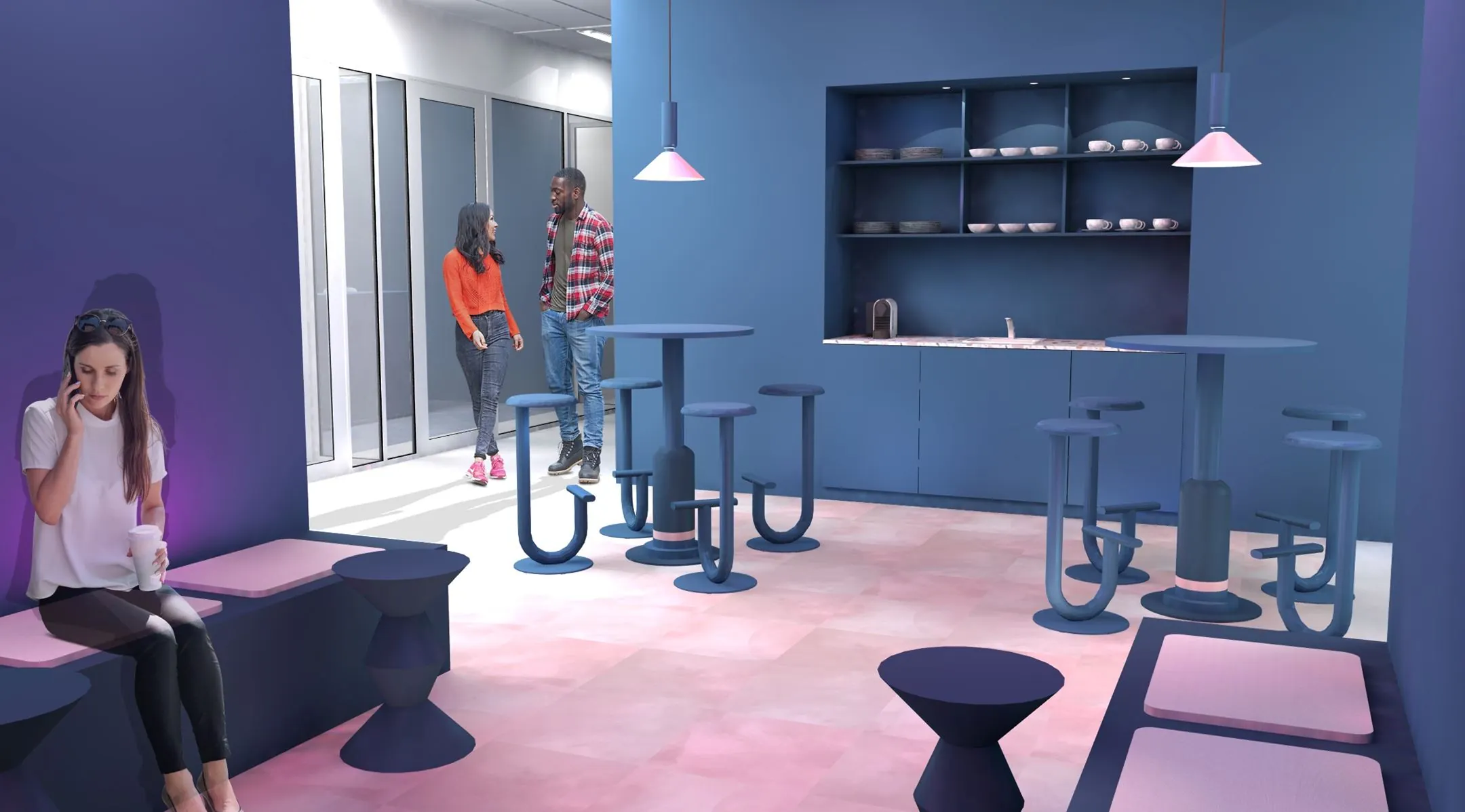 Moderne kantoorlounge op Wilhelminaplein 1 in Rotterdam met zitgedeelte, keukenblok en collega’s in gesprek.