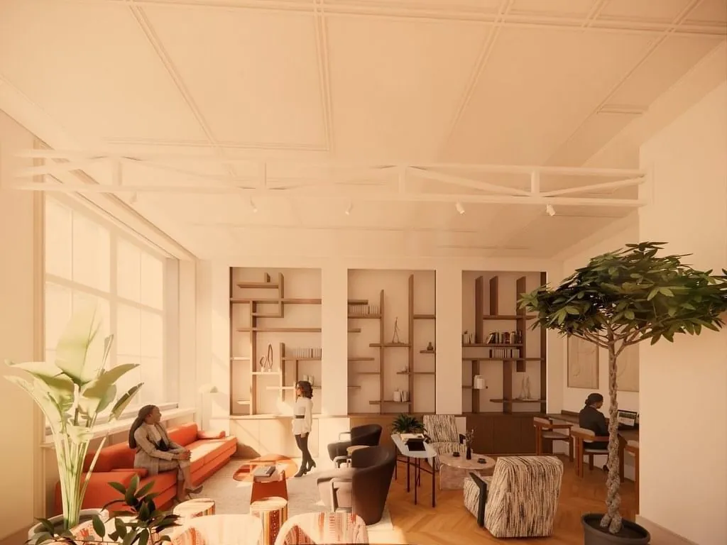 Stijlvol ingerichte kantoorruimte aan de Keizersgracht 264 in Amsterdam met zithoeken, boekenkasten en grote ramen.